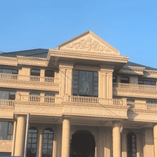 益阳黄金麻别墅外墙干挂石材效果示例